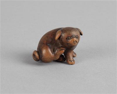 Netsuke eines sich kratzenden Welpen, - Asiatische Kunst