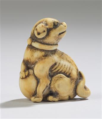 A Netsuke of a Seated Dog with Ball, Japan, 19th Century, - Asian Art