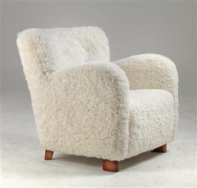 An armchair, designed and manufactured by Fritz Hansen, - Design