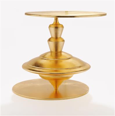 A “Spin Tops II” side table, designed by Paolo Giordano, - Design