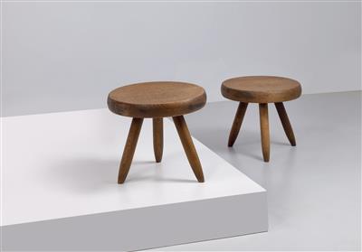 A pair of low tripod stools, designed by Charlotte Perriand, - Design