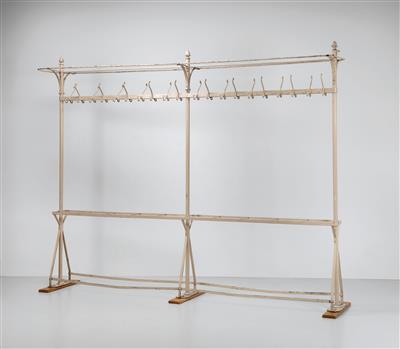 A large free-standing iron hallstand, designed by architects Fellner & Helmer, - Design