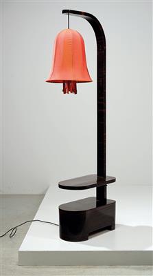 A floor lamp featuring an integrated side table, designed by Otto Prutscher - Design