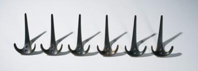 A set of six clothes hooks, - Design