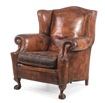 A wing-back leather chair, - Furniture and Decorative Art