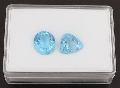 2 lose behandelte Topase zus. 53,15 ct - Exklusive Diamanten und Farbsteine