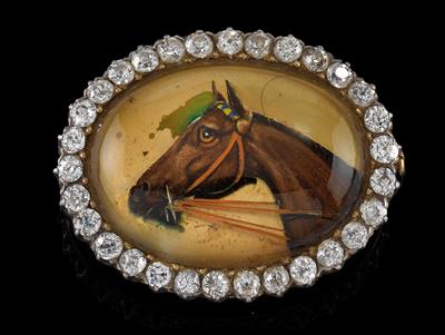 A diamond and crystal brooch with a horse’s head - Jewellery