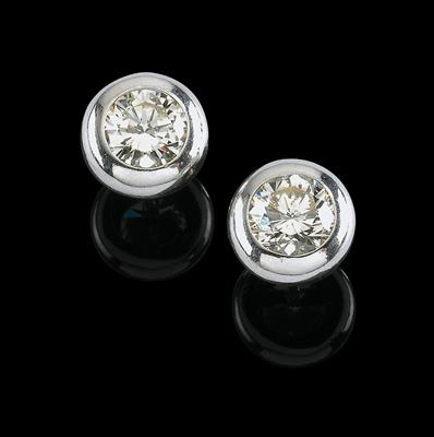 A pair of brilliant solitaire ear screws, total weight ca. 3,20 ct - Jewellery