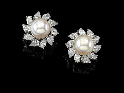 A pair of diamond and cultured pearl earclips, - Jewellery