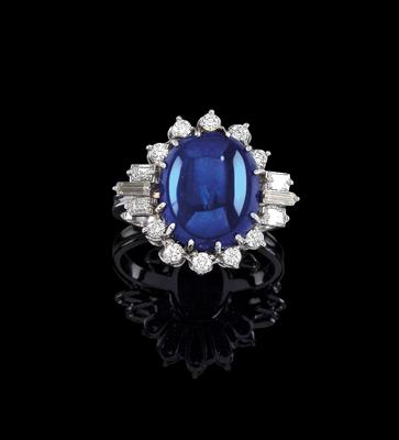 A diamond ring with an untreated sapphire c. 10.20 ct - Gioielli