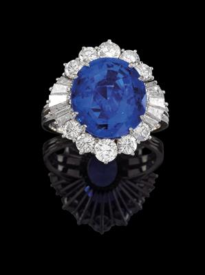 A diamond ring with an untreated sapphire c. 8 ct - Gioielli