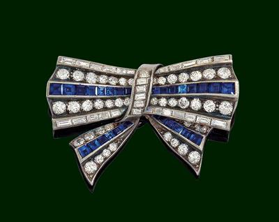 A diamond and sapphire brooch - Jewellery