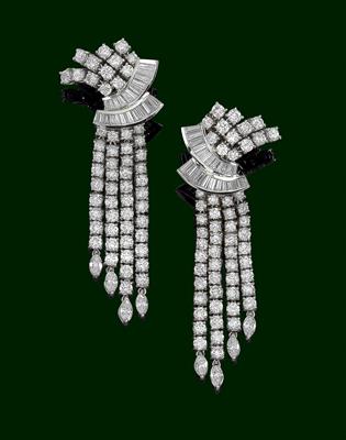 A pair of diamond ear clips, total weight c. 11 ct - Jewellery