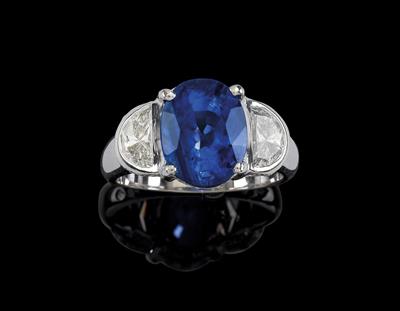 A diamond ring with a sapphire c. 5.50 ct - Jewellery