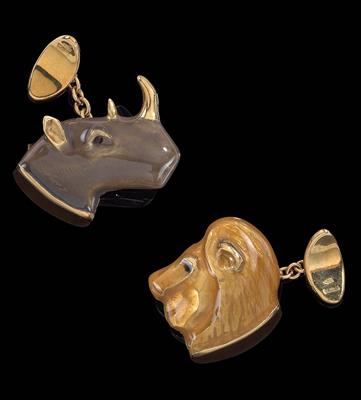 A pair of cufflinks in the shape of a lion and rhinoceros - Gioielli