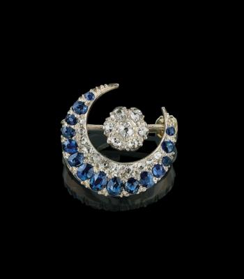 A diamond and sapphire moon brooch - Gioielli