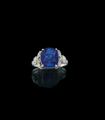 A diamond ring with a sapphire c. 6 ct - Gioielli