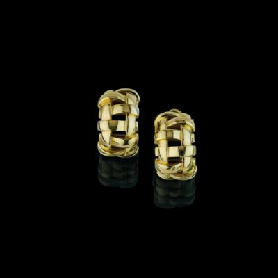 A pair of ear clips by Tiffany & Co - Exquisite Jewels